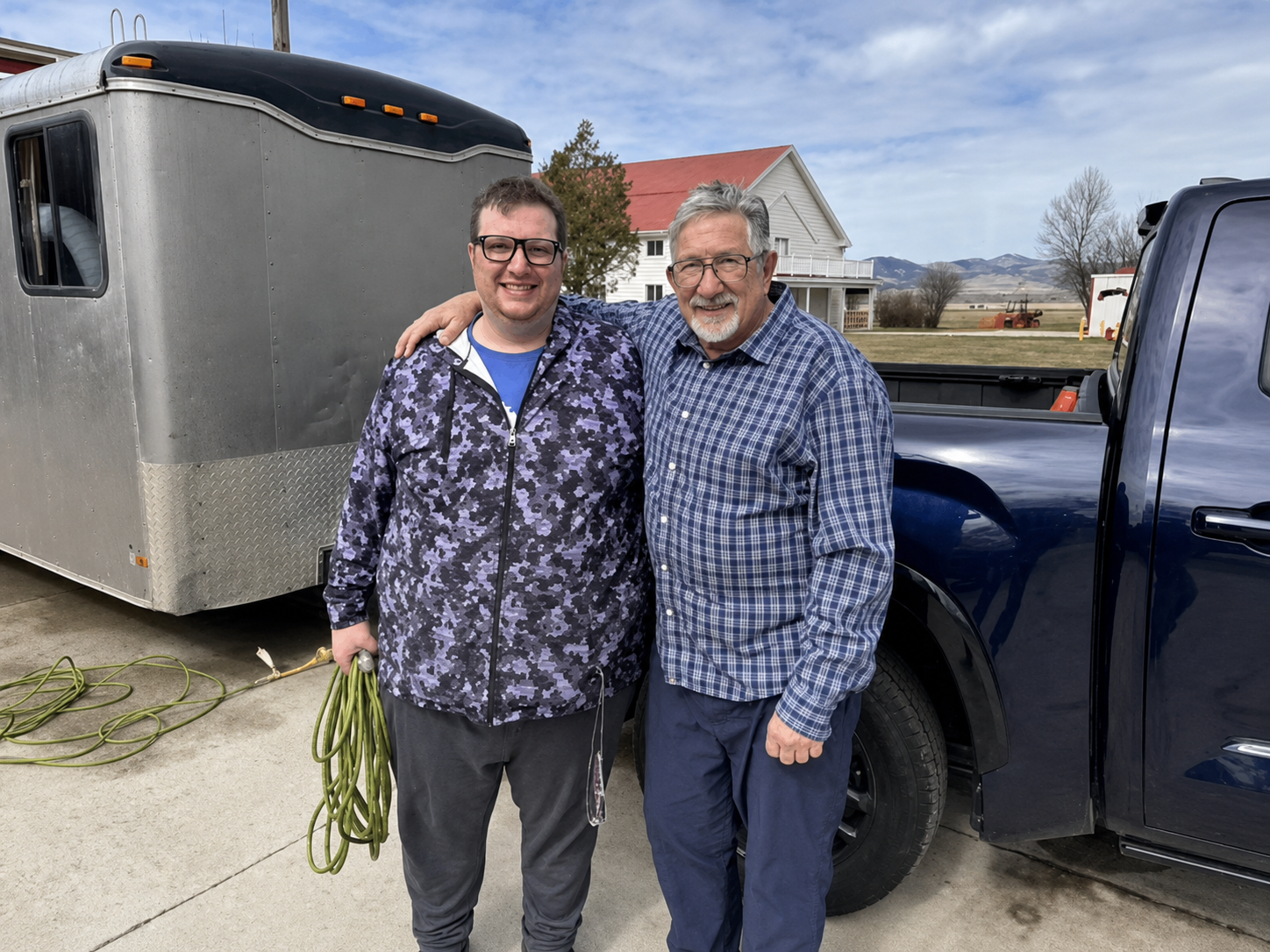 Tim Doerr and Dakota Doerr with the T and S Mobile Hearing Express trailer